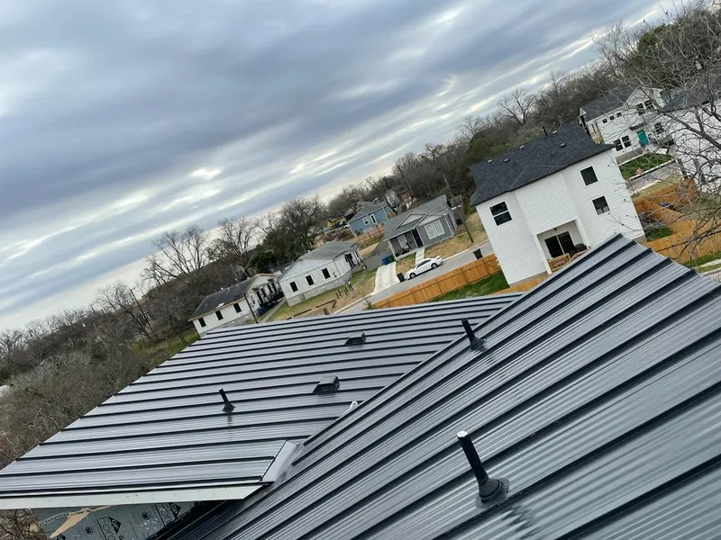 Standing seam metal roof panels with vents for Skylight Repair in North Haven
